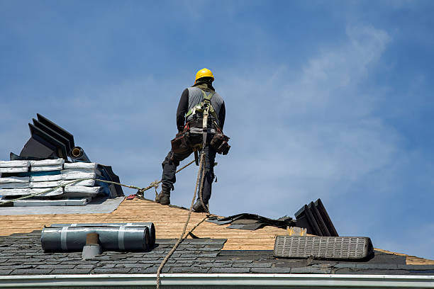 Professional Gutter Installation technician working in Cedar Crest, MA